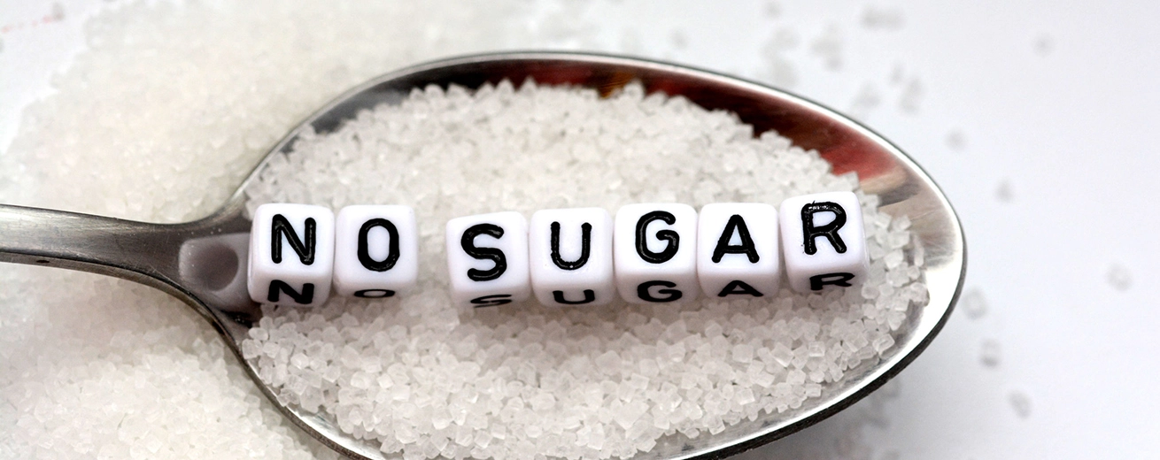 lepel met suiker en letters 'geen suiker'